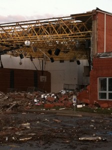 This image offers a view into the tragedy that occurred on that day: the entire gymnasium wall and most of the roof destroyed.